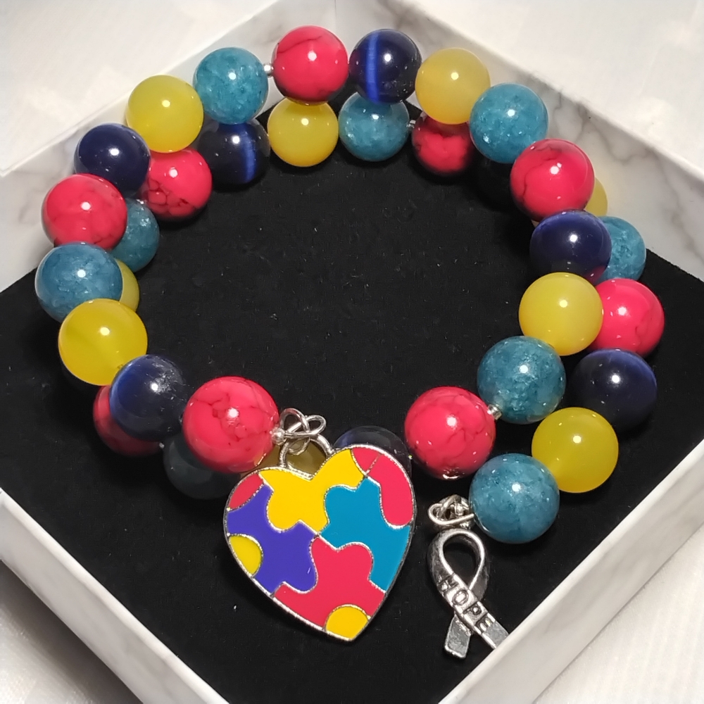 **Handmade Autism Awareness Bracelet – Celebrate Uniqueness** 💙💛❤️💚